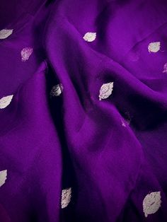 SILK MARK CERTIFIED !!!Gorgeous Pure Chiffon Silk Saree in Eggplant Purple Colorwith Sliver Zari Work. Item : SareeBase Fabric : Pure Chiffon Color : Indigo Blouse piece : Comes with un-stitched Blouse piece.Blouse material : Pure ChiffonFall & Edging(Yes/No) : YesSilk Mark Certificate given with the Saree(Yes/No) : Yes Disclaimer -:- Color variation is possible due to various reasons like phone or desktop setting, resolution etc. Please don't hold us responsible. Our aim is to put the exact col Purple Georgette Blouse Piece For Celebration, Celebration Purple Georgette Blouse Piece, Silver Art Silk Blouse Piece, Silver Blouse Piece With Dupatta For Party, Silver Saree For Celebration, Party Silver Blouse Piece With Dupatta, Silver Cutdana Blouse Piece For Party, Silver Blouse Piece With Cutdana For Party, Silver Dupatta With Pallu For Party