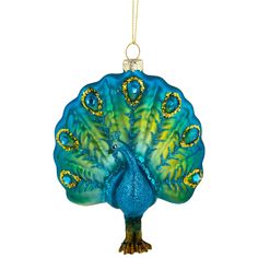 a glass ornament shaped like a peacock