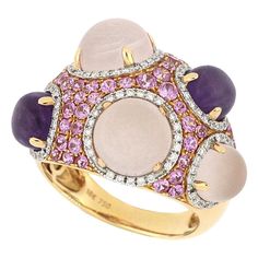 This large unique cocktail ring features 2 natural amethyst and 3 pink quartz, weighing 2.31ct and 6.72ct respectively, surmounted with pink sapphire (1.53ct) and diamonds (0.33ct), mounted in 18 karat rose gold. O’Che 1867 is renowned for its high jewellery collections with fabulous designs. Our designs reflect the cultural and aesthetic value of its origin – Macau, where East meet West, with the inspiration from the beauty of oriental and Roman art. The finest hand selected precious stones ins Pink Gold Ring, Pink Gold Rings, Rose Gold Opal Ring, Retro Ring, Opal Ring Gold, Purple Sapphire, Gold Cocktail Ring, Pink Bling, Gold Cocktail