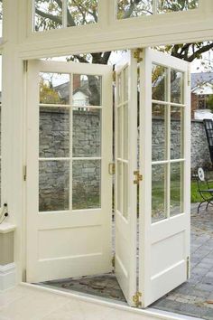 an open door leading to a patio area