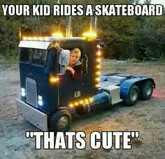 a kid rides a skateboard that's cute on the back of a truck