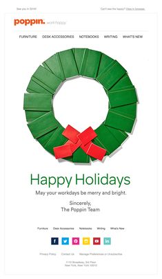 the website for poppin's holiday cards is displayed with an image of a green wreath