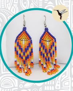 Description: English 🇺🇸 🪢 Material:  Beaded Earrings.  ✨ Exclusive design piece handmade by Inga Indigenous. 📦 Shipments across the United States are free (shipping times may vary), if you are in Portland, Oregon USA we deliver it in 1 business day. 👌 A different, original, and special detail or gift, perfect for birthdays, Christmas, or any other occasion. Spanish 🇨🇴 🪢 Material: Tejeduría en mostacilla checa. ✨ Diseño exclusivo, pieza hecha a mano por indígenas Inga.  📦 Envios a todo Estados Unidos gratuitos (los tiempos de entrega pueden variar), si tú estás en Portland, Oregon te entregaremos tu pedido al día siguiente entre semana, no aplica para fines de semana, o festivos. 👌 Un detalle o regalo diferente, original y especial, perfecto para cumpleaños, Navidad o cualquier ot Artisan Orange Beaded Earrings, Adjustable Multicolor Fair Trade Earrings, Artisan Handwoven Orange Earrings, Artisan Orange Handwoven Earrings, Multicolor Fair Trade Beaded Earrings For Gifts, Multicolor Handwoven Teardrop Earrings, Handwoven Multicolor Teardrop Earrings, Multicolor Fair Trade Dangle Earrings, Handmade Southwestern Multicolor Earrings