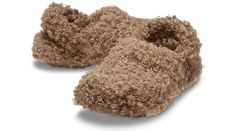 This toasty lined version of the Classic Clog features a soft faux doodle fur lining, as well as faux doodle fur covering the upper. The soft, fuzzy liner adds to the cushion and comfort, indoors or out. Great as a slipper, yet capable to run errands, too. Croslite™ foam construction keeps them light and easy to wear. The pivoting heel strap gives you a secure fit, or push it forward to just step in and go.  Classic Faux Doodle Fur Clog Details:     The legendary Classic Clog, with a faux doodle fur liner   Fuzzy faux doodle fur on upper   Incredibly light and easy to wear   Pivoting heel straps for a more secure fit   Great indoors or out   Dual Crocs Comfort™: Blissfully supportive. Soft. Cradling comfort. Grinch Halloween, Wip Bag, Men's Beanies, Water Sandals, Trouser Socks, Saltwater Sandals, Crocs Classic Clogs, Fly London, 47 Brand