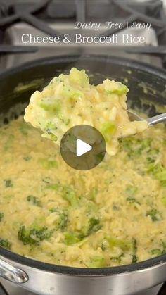 broccoli and rice cooking in a pot with a ladle full of it