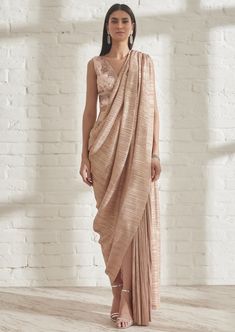 Our signature metallic 2.0 sari comes with a built in petticoat. Lightweight, fuss free and easy to wear, it’s the perfect piece to carry to destination weddings. Metallic Saree, Drape Sarees, Pleated Saree, Desi Fits, Drape Saree, Saree Designs Party Wear, Pink Metallic, Indian Fashion Designers, Embellished Top