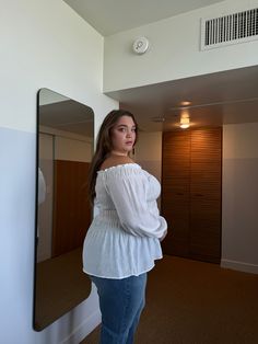 The Plus Size Off The Shoulder Boho Top is a simple and trendy off-shoulder top that needs to be a part of every plus size girl's collection. This off-shoulder top currently comes in three different colors: white, black, and blue. This smocked, off-the-shoulder top features ruffled hems and long sleeves with elastically cinched wrists. The smocked detailing makes up most of the torso of the top and lends to a flattering, dynamic shape. This top is made from 75% rayon and 25% nylon. Hand wash col Plus Size Off The Shoulder, White Boho Tops, Shoulder Tops, Boho Top, Off Shoulder Tops, Boho Tops, Ruffle Hem, Smocking, Shoulder Top