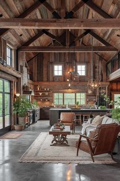 a living room filled with furniture and lots of wooden beams on the ceiling, along with large windows