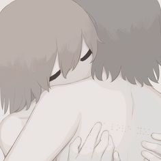 two people hugging each other with their backs to one another