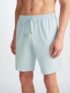 Featuring a combined elastic and tie waistband, our Basel ice blue jersey lounge shorts also feature two front side pockets and a rear back pocket to keep your phone and essentials close while you're lounging. Both comfortable and stylish, we've elevated this loungewear short into a luxury essential for the modern man. Made from a unique blend of micro modal stretch, our specially developed Basel fabric is ultra-soft and doesn't pill, making it able to withstand countless days of lounging, numer Short Gown Dress, Cashmere Loungewear, Holiday Capsule Wardrobe, Duvet Day, Cotton Dressing Gown, Silk Dressing Gown, Long Gown Dress, Merino Sweater, Blue Jersey