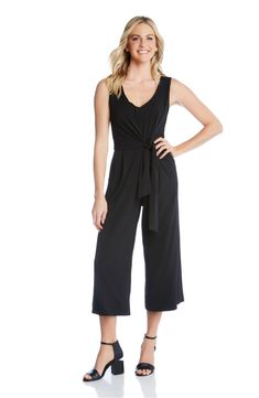 A drapey tie defines the waist of this easy stretch-knit jumpsuit styled in a sleeveless silhouette with cropped wide legs. 23" inseam; 23" leg opening (size Medium) Back zip closure V-neck Sleeveless Attached waist tie 92% polyester, 8% spandex Machine wash, line dry Made in the USA of imported fabric Women's Clothing Casual Sleeveless Belted Jumpsuits And Rompers, Sleeveless Jumpsuits And Rompers With Tie Waist For Loungewear, Chic Sleeveless Jumpsuits And Rompers With Tie Waist, Casual Sleeveless Jumpsuit With Tie Waist, Sleeveless Workwear Jumpsuit With Tie Waist, Black V-neck Jumpsuits And Rompers For Office, Office V-neck Black Jumpsuit, Casual Black Jumpsuit With Built-in Bra, Solid V-neck Belted Jumpsuit