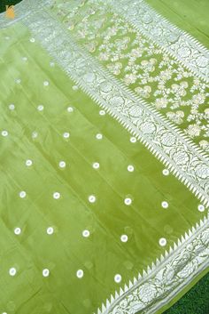 Add traditional hues to your wardrobe with Khinkhwab’s exclusive range of georgette sarees perfect to complete that regal look this season. This exclusive pure georgette Handloom Banarasi Silk saree has small silver zari dollar booties all over and an intricately woven floral silver zari border that adds to its beauty and grace. Pista Green Katan Silk Dupatta For Traditional Ceremonies, Pista Green Self Design Dupatta For Traditional Ceremonies, Pista Green Self-design Dupatta For Traditional Ceremonies, Saree With Sheer Dupatta For Traditional Ceremonies And Festivals, Festival Saree With Sheer Dupatta For Traditional Ceremonies, Pista Green Dupatta In Georgette, Traditional Drape, Unstitched Pista Green Saree For Traditional Ceremonies, Semi-stitched Pista Green Saree For Traditional Ceremonies, Pista Green Semi-stitched Saree For Traditional Ceremonies