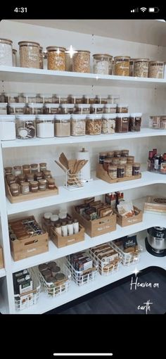 the shelves are filled with many different types of food in containers and boxes on them