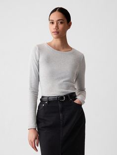 Soft knit stretch cotton and modal t-shirt.  Crewneck.  Long sleeves.  Fit: Stretch-to-Fit.  Slim & stretchy that forms to your shape.  Hits at the hip.  Models wearing Gap