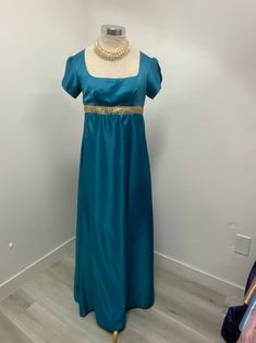 Elegant Blue Gown For Fancy Dress, Elegant Blue Gown For Costume Party, Elegant Green Gown For Costume Party, Elegant Gold Dress For Costume Party, Blue Regency Style Floor-length Dress, Elegant Fitted Evening Dress For Costume, Elegant Floor-length Evening Dress For Costume, Blue Regency Style Evening Dress, Elegant Green Gown For Fancy Dress