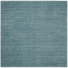 a blue rug with horizontal stripes on the top and bottom, it is very soft