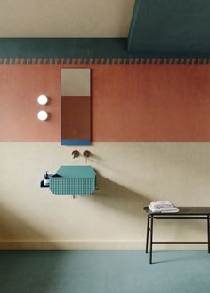 a bathroom with a sink, mirror and stool in the corner next to a wall