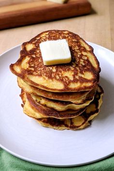 there is a stack of pancakes with butter on top and the words chickpea pancakes above it