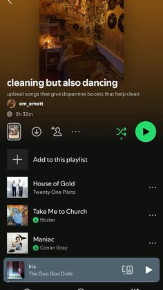 an app showing the music player's playlist on their iphone screen, with text that reads cleaning but also dancing