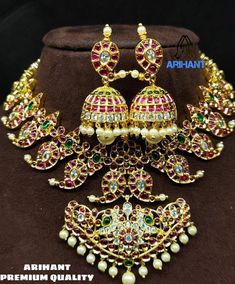 Most beautiful gold replica kempu  mango necklace with earrings Gold Hand Set Temple Necklace For Reception, Intricate Design Jewelry Sets For Reception And Festivals, Gold Kundan Necklace With Elegant Design For Reception, Gold Temple Jewelry Sets For Reception, Gold Jewelry Set With Intricate Design For Reception, Festive Traditional Kundan Necklace With Elegant Design, Gold Temple Necklace With Stone Work For Reception, Festive Kundan Temple Necklace With Elegant Design, Kundan Temple Necklace With Elegant Design