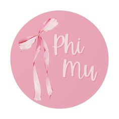 a pink sticker with the words phi mu on it and a ribbon tied around it