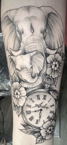 an elephant with flowers on its leg and a clock in the other hand is shown