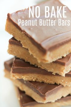 chocolate and peanut butter bars stacked on top of each other