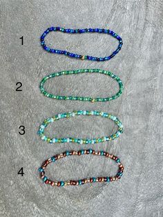 Czech glass and goldfilled bead bracelets. Bead size: bracelets numbered 1,  2, 5 and 8 are 3mm; 3 and 4 are 4mm; 6 and 7 are 2mm.  Made to order so if the size in the menu does not work, please DM me and I can make a custom listing. Sizing tips: Measure wrist using a soft tape measure or string.  Measure below wrist bone or where you want to wear bracelet. Add length to get desired fit: 0" for fitted; .25" for some movement; .5" for relaxed; .75" for loose; 1" for extra loose.  Size pictured is 7 inches.  Sizing for stacks. You may want multiple sizes for a stack. Bracelets are hand-made and made to order so sizing will vary slightly. For best use, roll bracelet on hand to wrist instead of stretching bracelet. Czech Glass Beaded Bracelets With Tiny Round Beads, Czech Glass Bracelets With Round Beads, Czech Glass Bead Bracelet, Bracelets Bead, Glass Beaded Bracelets, Bead Bracelets, The Menu, Tape Measure, Czech Glass Beads