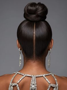 41 Sleek Bun Hairstyles for Black Women: A Style Guide Hair In A Bun Black Women, African American Bun Hairstyles, Updo Bun Hairstyles Black Women, Buns On Black Women, Pondo Hairstyles For Black Women Short, Formal Hair Black Women, High Bun Black Women, Cute Bun Hairstyles For Black Women, Bun Styles For Black Women