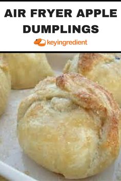 some type of air fryer apple dumplings on a white tray with text overlay that says, air fryer apple dumplings