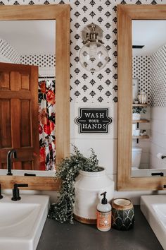 the bathroom is decorated in black and white