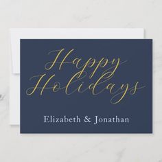 a happy holidays card with gold lettering on a dark blue background and the words, happy holidays