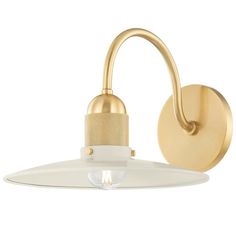 an image of a light fixture on a white wall with a gold metal arm and glass shade