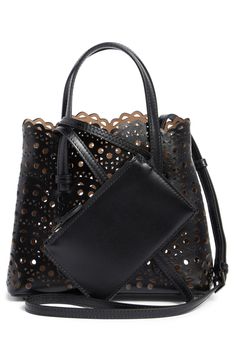 The label's Mini New Vienne motif is laser-cut for a lacy look on this calfskin micro tote featuring snap side gussets that let you expand the silhouette. Open top Top carry handles; removable, adjustable shoulder strap Snap gussets Removable tethered zip pouch Structured silhouette with flat base and protective metal feet Lambskin-leather lining Leather Made in Italy Designer Handbags Elegant Leather Shoulder Bag With Perforations, Leather Shoulder Bag With Perforations, Perforated Leather, Top Top, Fabric Gift Bags, Fabric Gifts, Zip Pouch, Anniversary Sale, Open Top