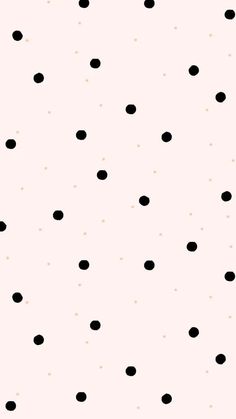 black and white polka dots on a pink background