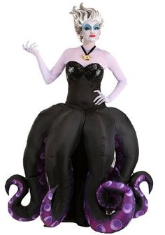 a woman dressed in black and purple sitting on an octopus