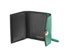 Serpenti Forever Slim Compact Wallet In Emerald Green Calf Leather With Black Nappa Leather Interior. Captivating Snakehead Press Button Closure In Light Gold-plated Brass Embellished With Black And White Agate Enamel Scales And Black Onyx Eyes. Luxury Trifold Wallet For Evening, Luxury Evening Trifold Wallet, Luxury Green Bifold Wallet, Elegant Green Wallet For Formal Occasions, Green Elegant Formal Wallets, Elegant Green Formal Wallet, Elegant Green Bifold Wallet, Onyx Eyes, Bulgari Serpenti