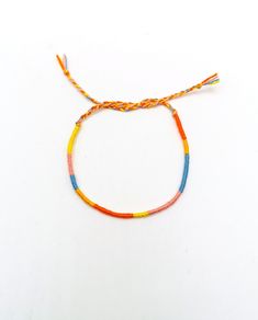 Sunset friendship bracelet Cotton thread Pastel colors Soft grunge Wrapped bracelet, Wrist stacks Kawaii style Best friends gift Vsco girl This colourful wrapped bracelet is made out of light blue,light yellow,orange,salmon coral and yellow cotton thread. It is ended with two braids in order to fit a lot of sizes. Custom orders for different color combinations are welcome. Width:0,2cm Other friendship bracelets in my shop: https://www.etsy.com/shop/LuckyRatJewellery?section_id=16489590&ref=shops Sunset Friendship Bracelet, Rat Jewellery, Thread Wrapped Bracelets, Bracelet Cotton, Bracelet Bff, Wrist Stack, Orange Salmon, Wrist Stacks, Style Kawaii