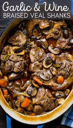 garlic and wine braised veal shanks in a skillet