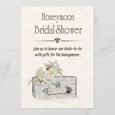 an advertisement for the honeymoon bridal shower with flowers in a suit case on it