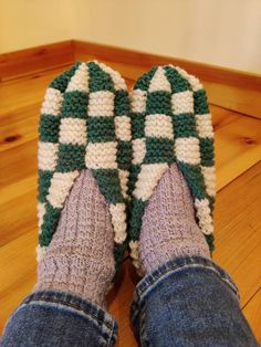 A rich forest green and natural white combination that are warm and cozy. Checkerboard slippers the way Grandma made them with a twist. Worked in wool blended with nylon, these slippers are wonderfully warm and long lasting! Two colours of wool are knit together to create a warm slipper with tons of cushioning.  Each pair is made to order, please see shipping times to estimate arrival. Message me for availability of other colours or any questionsy Comfortable Green Indoor Slippers, Green Slip-on Winter Slippers, Green Comfortable Slippers With Round Toe, Green Casual Slippers For Winter, Comfortable Green Winter Slippers, Comfortable Green Slippers For Winter, Knit Slippers, Wool Slippers, Warm Slippers