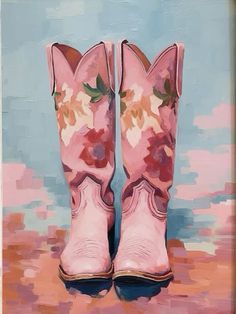 a painting of pink cowboy boots with flowers on them