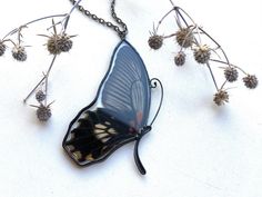 It is handcrafted exclusive design pendant made with glass and real butterfly wings. Each of our pendants can not be repeated exactly. The pendant can be worn on both sides. It will be nice anniversary gift. All jewelry comes in a cardboard box ready to be gift wrapped. And other unique jewelry here https://www.etsy.com/shop/RosavaGlassStore We accept only PayPal. Item is ready to ship, we will send it within 1-3 bussines days after payment confirmation. We do not ship on Saturdays and Sundays. Elegant Black Necklace With Butterfly Charm, Black Butterfly-shaped Jewelry For Gift, Black Butterfly Charm Jewelry, Black Butterfly Jewelry For Gift, Wing-shaped Black Jewelry Gift, Wing-shaped Black Jewelry For Gifts, Black Wing-shaped Jewelry Gift, Black Wing-shaped Jewelry For Gifts, Gift Black Jewelry With Wing-shaped Pendant