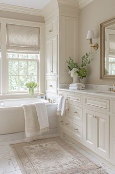 Is it possible for a bathroom to be both minimalist and luxurious? With the right touch, neutral tones can elevate a space, proving that less really can be more. In this article, we'll explore 29 chic neutral bathroom decor ideas that blend simplicity with sophistication, achieving timeless elegance. From soothing grays to warm beiges and every shade in between, discover how a palette of understated hues can transform your bathroom into a refined Cream And Marble Bathroom, White Bathroom Beige Tile, First Floor Bathroom Ideas, Cream Cabinet Bathroom, Elegant White Bathroom Ideas, French Style Master Bathrooms, Best Bathroom Countertops, Light Neutral Bathroom, Neutral Marble Bathroom