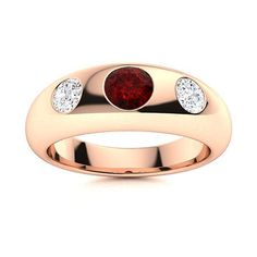 a rose gold ring with two diamonds and a red garnetia stone in the center