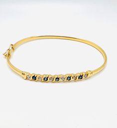 14K Yellow Gold Diamond & 0.06ct Blue Sapphire Bangle Bracelet Size 8 A perfect gift for your loved one for any special occasion or holiday!  Total Bracelet Weight: 6.33g Bracelet Length: 8 inches  Bracelet Width: 3.92mm Gemstone: Diamond, Blue Sapphire Bracelet Closure:  Item will be put in a Gift Box. * Sapphire Bangle, Blue Sapphire Bracelet, Art Deco Bracelet, Heart Shaped Rings, Sapphire Bracelet, Ruby Diamond, Diamond Fashion, Chain Link Necklace, Gorgeous Earrings