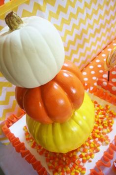 there is a pumpkin on top of some candy