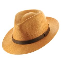 A man of mystery and undeniable style. Designed to help you keep your cool in any situation, with a padded comfort sweatband of exceptional breathability. Made of straw and is the color of toasted wheat, finely handwoven in Ecuador, and completed in the USA with a deep mocha leather hatband. Summer discoveries are waiting. Grab your hat, and get started. Brim width: 2 3/8 Inches Crown Height: 4.5" Inches Brim and crown measurements may vary slightly since this product is handwoven Fitted Brown Toquilla Straw Hat, Classic Brown Straw Hat For Summer, Fitted Brown Casual Straw Hat, Fitted Brown Straw Hat Casual, Classic Brown Panama Hat For Outdoor, Fitted Casual Brown Straw Hat, Classic Woven Adjustable Panama Hat, Classic Lightweight Adjustable Hat, Classic Adjustable Woven Panama Hat