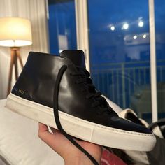 Common Projects Leather High Top Sneakers 42 Black Lightly Used Leather Ankle-high Sneakers With Vulcanized Sole, Ankle-high Leather Sneakers With Leather Sole, Black Lace-up High-top Sneakers With Leather Sole, Leather Ankle-high Sneakers With Rubber Sole, Classic Black Leather High-top Sneakers, Classic Leather Ankle-high Sneakers, Black Leather Urban High-top Sneakers, Classic Ankle-high Leather Sneakers, Black Leather High-top Sneakers With Gum Sole