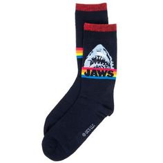 Give your fashion some bite with these Jaws Crew Socks! These stylish socks are navy blue with red cuffs and feature the head of the most famous shark of all time in its pose from the iconic movie poster. The word "Jaws" is displayed in navy blue letters over a band of red, orange, yellow, and blue stripes. Wear them out on the town or as you lounge in your entertainment room watching your favorite movie! Details: 	 Size: Men's 6.5 - 12 	 Content: 98% Polyester & 2% Spandex 	 Care: Machine Wash, Wearable Art Fashion, Blue Letters, Iconic Movie Posters, Stylish Socks, Home Supplies, Red Orange Yellow, Fall Essentials, Entertainment Room, Iconic Movies